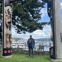 Photo op under a totem arch at the Port.