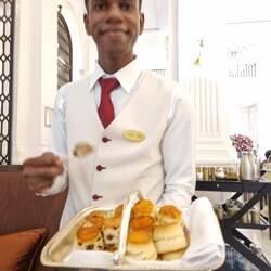 Lovely waiter with the scones who chatted and then brought books