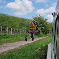 One man and his err... cat. In matching rainbow jackets ❤️🧡💛💚💙🩵💜