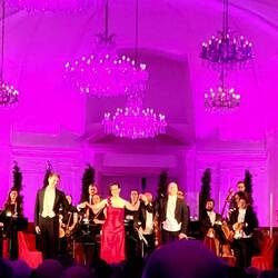 The Opera singers, conductor & musicians take a bow