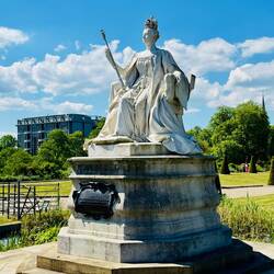 Queen Victoria standing guard over her Palace