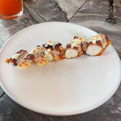 Octopus with roe and butter sauce and something citrus