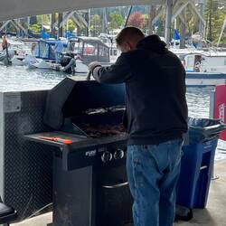 NMI's Michael cooking the steaks.