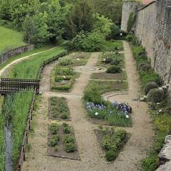 Lovely medieval garden against the village ramparts