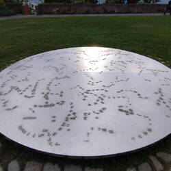 A sculpture etched by a robot in ASCII of the first Austrian cosmonaut 's message.