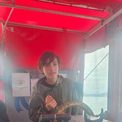 Thomas at the helm