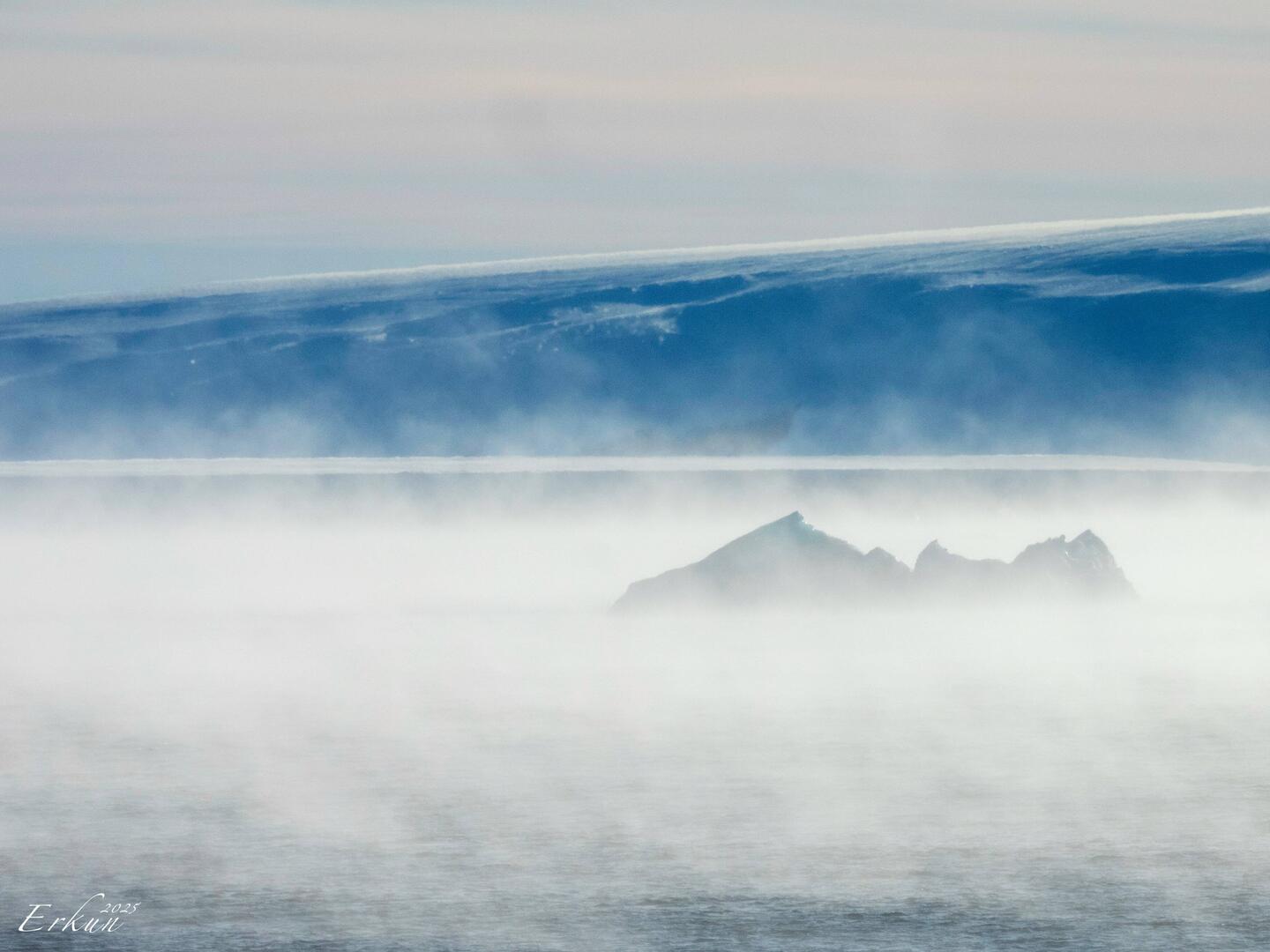 Sea smoke forms just before the sea freezes — Vahsel Bay, Antarctica.