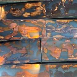 Instalation of burnished steel on wall,to represent the rusted Titanic