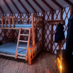 Inside the yurt with the fireplace