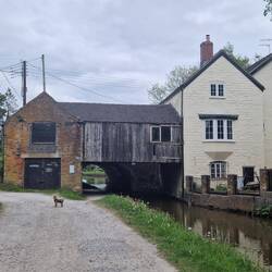 A totally wooden structure straddling the canal at Cheddleton Flint Mill