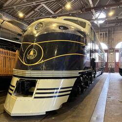 E-type diesel-electric locomotive, has two 2-stroke V-12 prime movers.