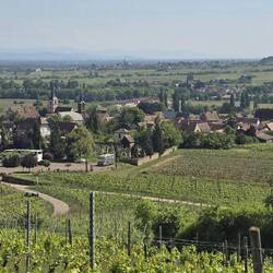 Views of the parking, village and beyond from a view point above the village