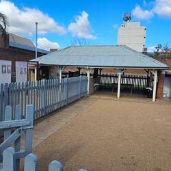 Outdoor exercise yard. Females on the left, males on the right.