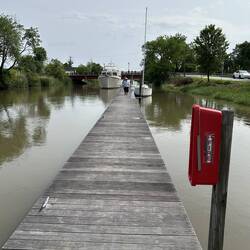 We've been located a long way down the wobbly wooden floating dock