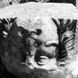 Old block of sculpture at the Roman temple ruins