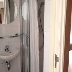 A curtain and glass door? Why?