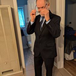 Dan making sure the tie is tied properly.