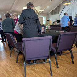 More folks milling about after the service.