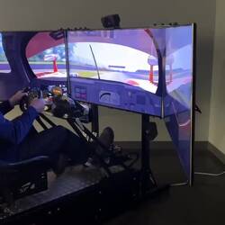 Having a helluva good time. Didn't do so hot on the first two laps, but got it down by lap three!