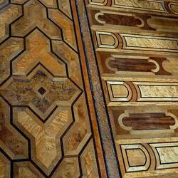 An intricately inlaid floor.