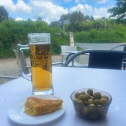 Spanish tortilla (potato and egg pie) for free and olives and with my cerveza grande