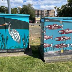Power Box murals. The geocache was a magnetic key box on the bottom of the salmon one.