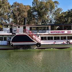 A heritage paddle boat, now converted to diesel power.