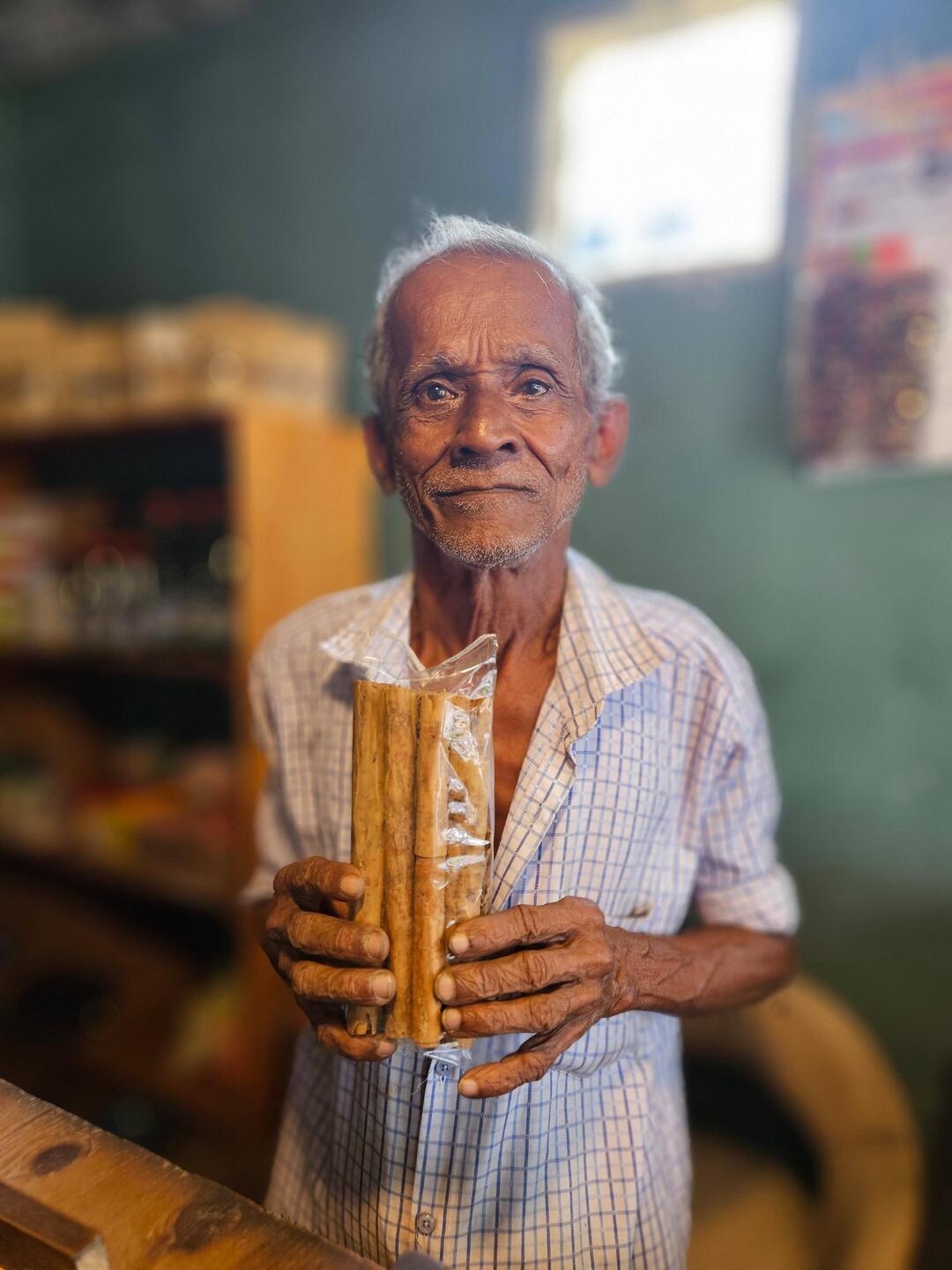 This spice seller was minding the shop for his daughter