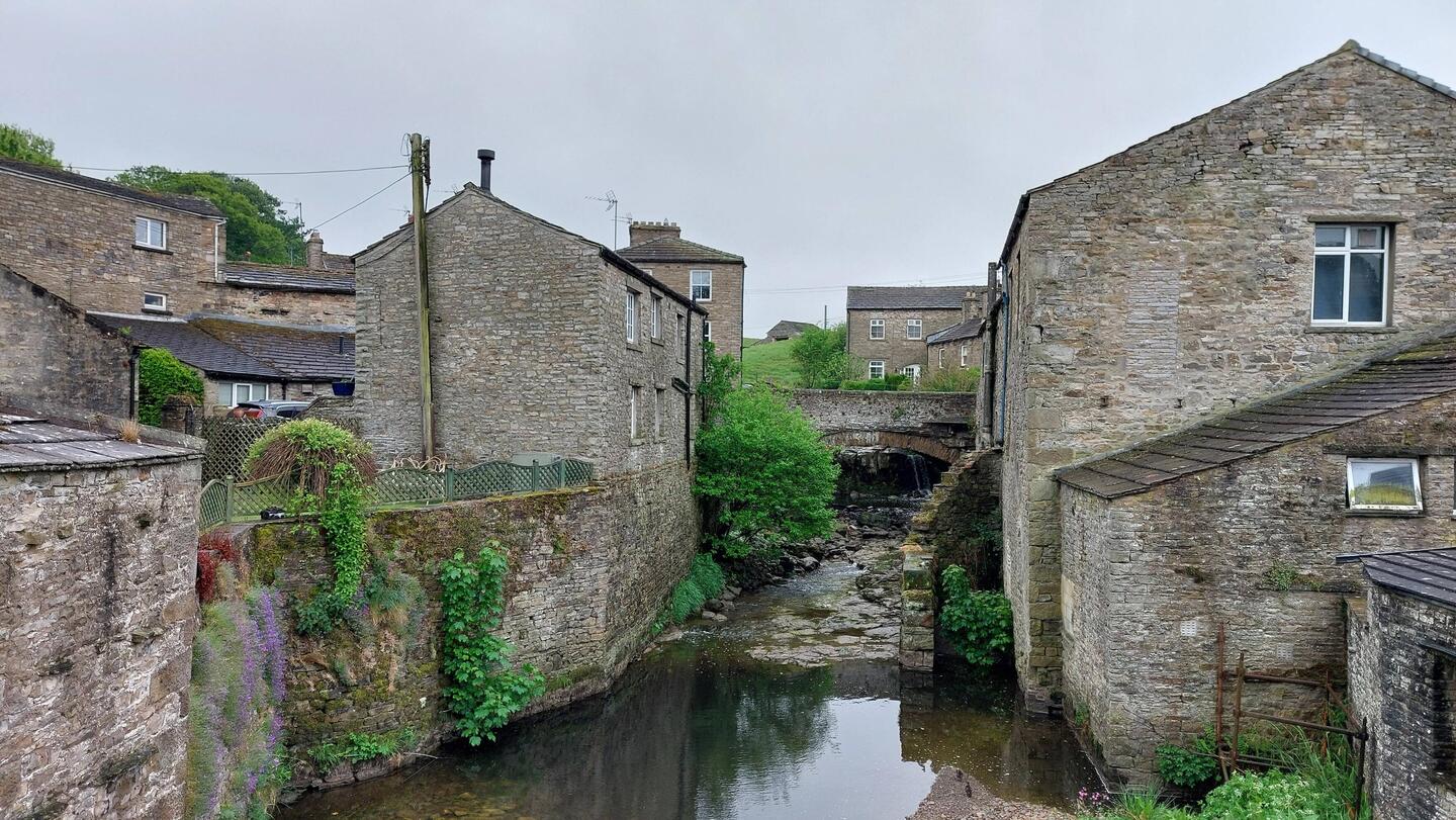 Hawes; view over a beck in the village