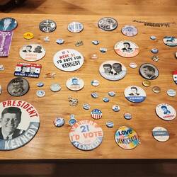 Campaign buttons, pins and various regalia