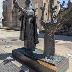 This is a statue of a dignitary who found a buried statue of Mary.