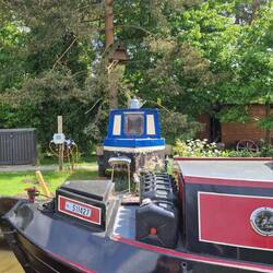 A tiny replica canal boat that looked as if it was used as a caravan