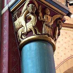 Carving showing a previous Pagan symbol.