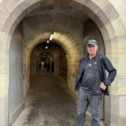 Entry to the old town through a walkway under the bridge