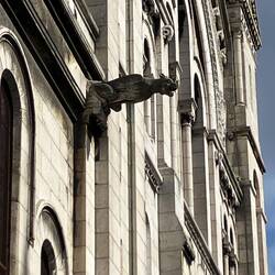 Gargoyles originated in medieval Europe to warn against Evil and serve as rain spouts.