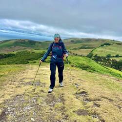 Trying not to be blown off the 'hill'. You can see how high we climbed