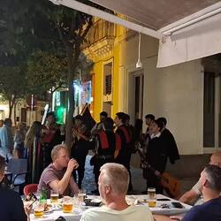 Unexpected serenade at supper