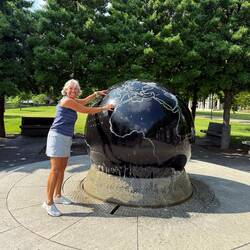 18,000 lb (8,200 kg) granite globe suspended by water