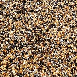 The sand is a mix of black and gold