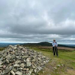 Moel Fenlli with Jubilee Fort behind and Liverpool distant