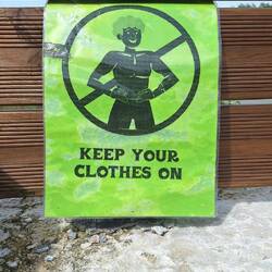 Lol...we all had to wonder why they needed a sign?!! Probably pilgrims taking off shirts in the heat