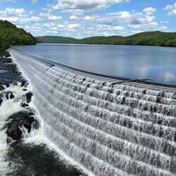 Perfect engineering allows the dam to keep feeding the river