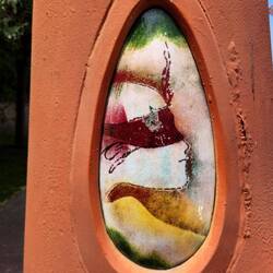 These ceramic tiles paintings are set in lamposts.