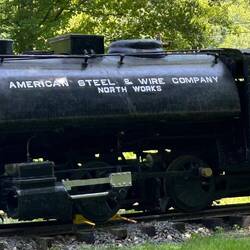 A narrow-gauge Vulcan-built 0-4-0 Saddle Tank industrial locomotive, incorrectly painted