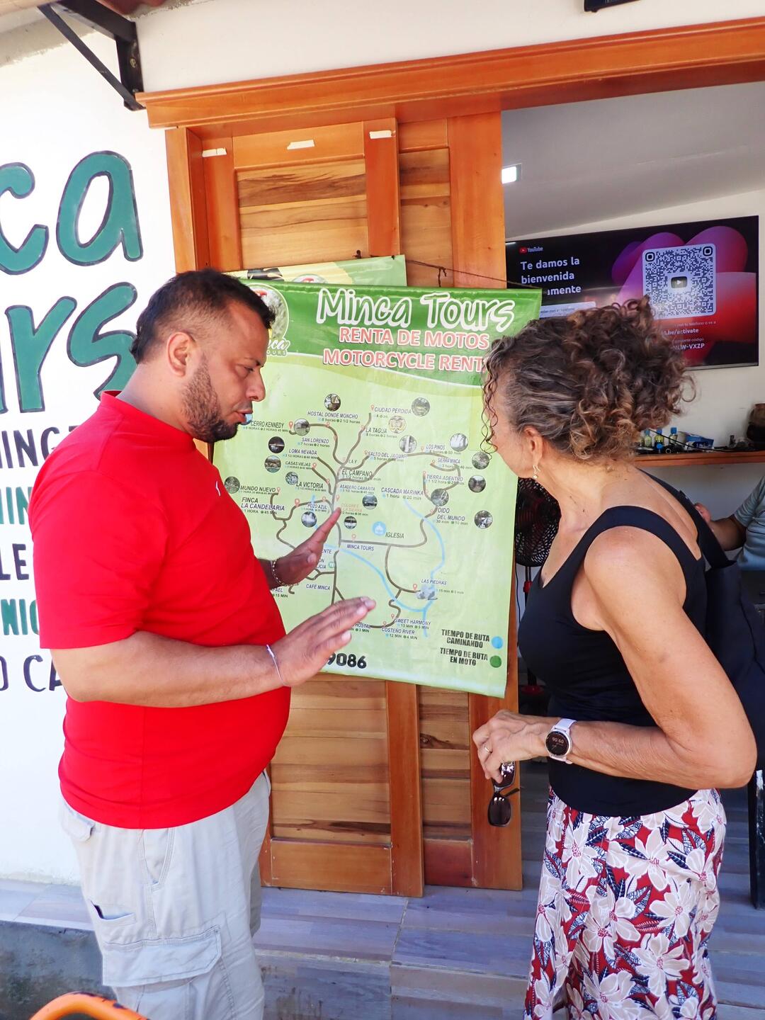 Alfredo, our driver and guide, maps out our tour plan for the day trip to Minca.