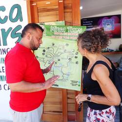Alfredo, our driver and guide, maps out our tour plan for the day trip to Minca.