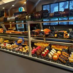 The circled cake was our choice, but one portion was a quarter so we shared.