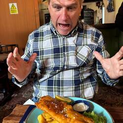 Paul's first fish and chips in the UK.