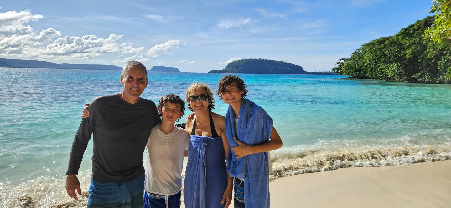 The crew on the beach in Champagne Bay.