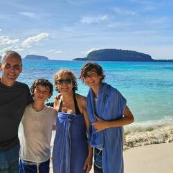 The crew on the beach in Champagne Bay.
